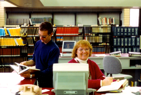 Tom Acra and librarian Brenda Hill, January 1993. (Photo: Richard Friend)